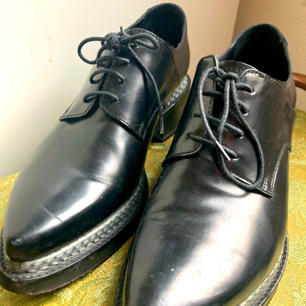Acne patent Oxford shoes.